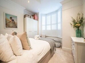 1 chambre, fer et planche à repasser, accès au Wi-Fi (inclus)