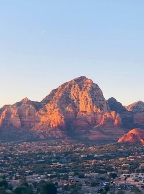 A mountain range with a town at its base. - Cozy Guest House Perfect For Couples w/ Hot Tub (Sedona)