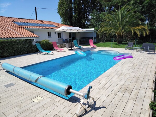 Piscine extérieure, piscine chauffée