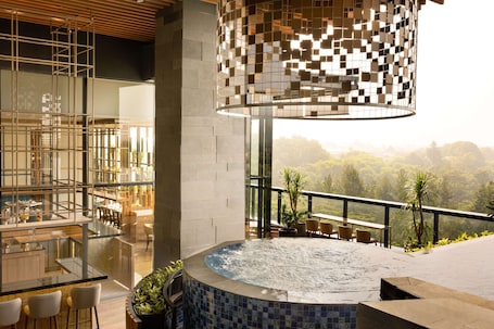 Outdoor pool, open 6:00 AM to 10:00 PM, free cabanas