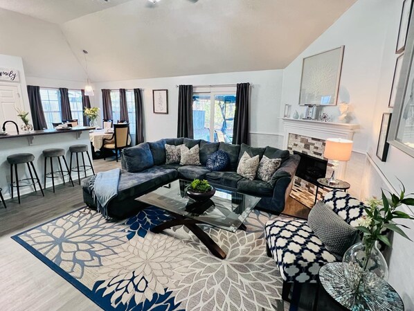 Smart TV, fireplace, books