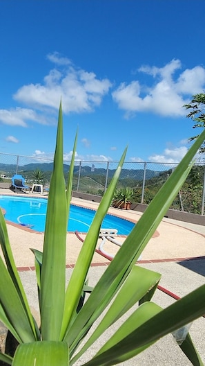 Outdoor pool - Villa Diana Hermosa Vista a las Montañas de PR un Lugar Donde Respiras Paz! (Las piedras)