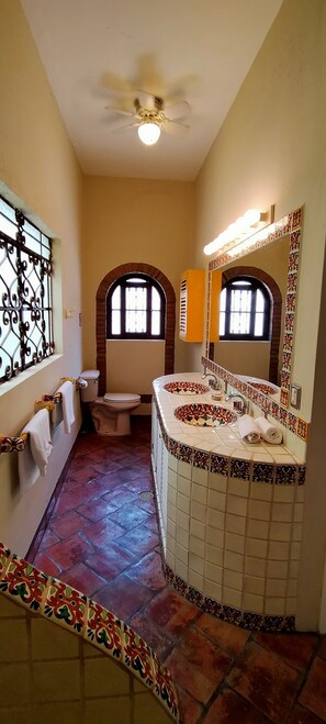 Superior Studio Suite | Bathroom | Shower, hair dryer, towels, soap - Victoria Suites (Puerto Vallarta)