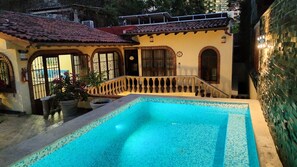 Outdoor pool, open 10:00 AM to 10:00 PM, sun loungers - Victoria Suites (Puerto Vallarta)