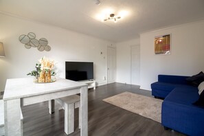 Apartamento | Área de estar | TV de tela plana
