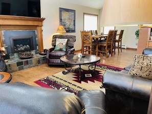 Smart TV, fireplace, table football, books