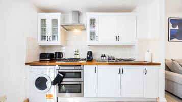 Apartment | Private kitchen | Fridge, microwave, oven, stovetop