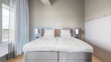 Blackout drapes, iron/ironing board, free WiFi, bed sheets