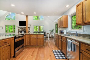 Private kitchen - Cozy Cottage w/ Shared Neighborhood Lake Access (Traverse City)