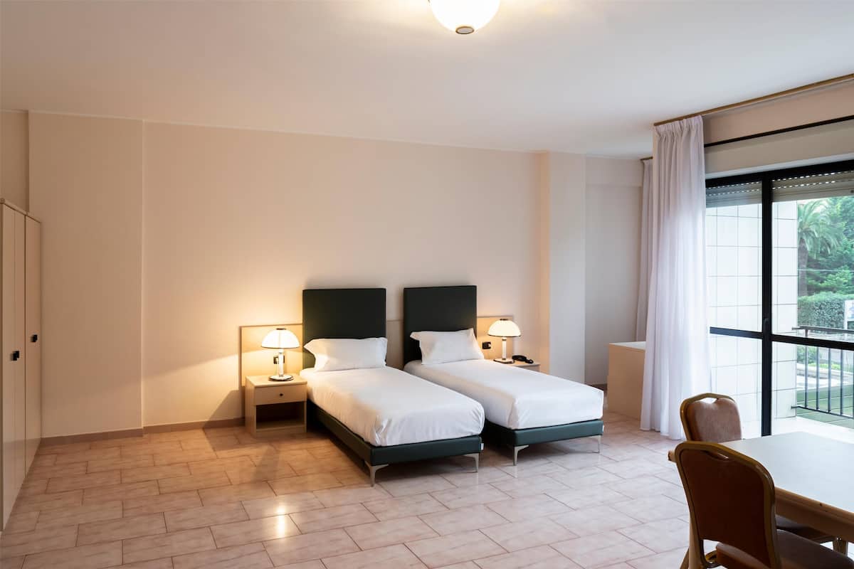 Standard Twin Room, Non Smoking | 1 bedroom, in-room safe, blackout curtains, free WiFi