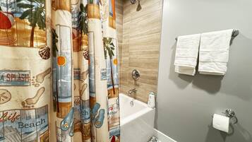 Hair dryer, towels, soap, shampoo