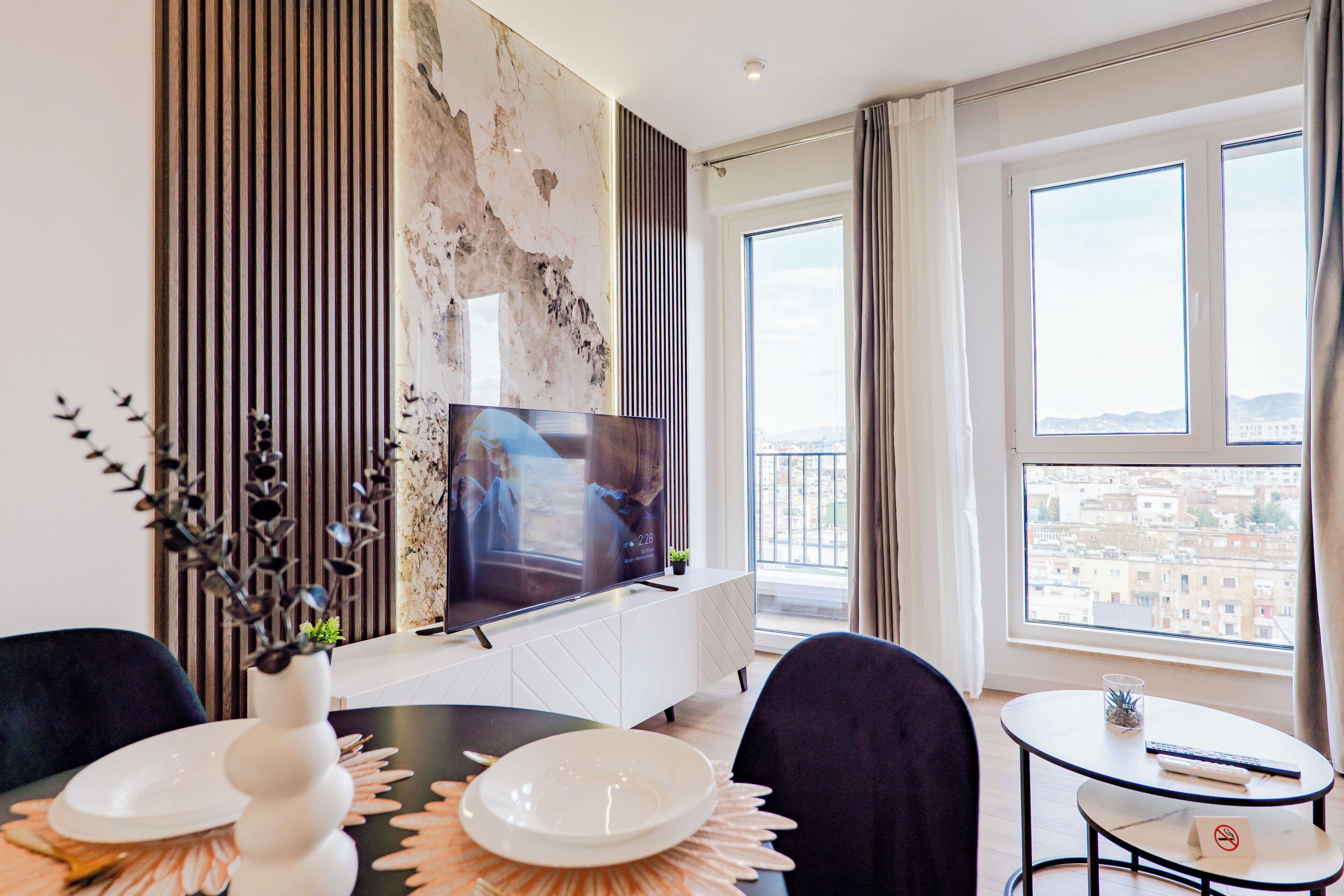 Deluxe Apartment | Living area | 42-inch Smart TV with cable channels