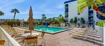 Snowbird-friendly condo with hot tub, outdoor pool, tennis, dock, BBQ, & balcony