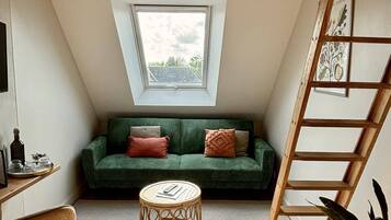 Standard Triple Room, Multiple Beds, Private Bathroom, Garden View | Living area | 80-cm Smart TV with digital channels, Netflix, streaming services