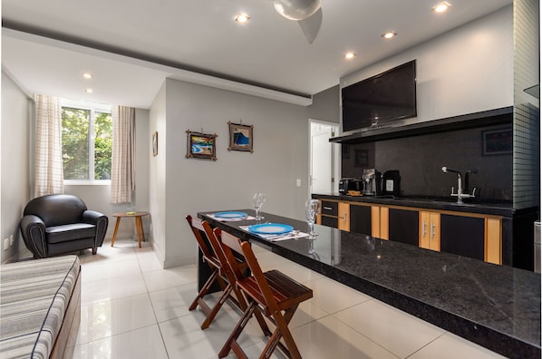 Fridge, microwave, coffee/tea maker, dining tables
