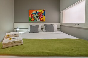 1 habitación, tabla de planchar con plancha, wifi gratis y ropa de cama 