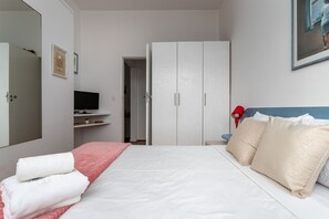 2 habitaciones, tabla de planchar con plancha y wifi gratis 
