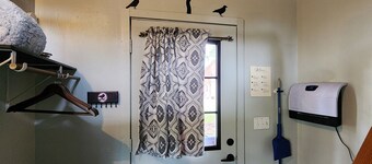 Dy cabin with shared bath house.