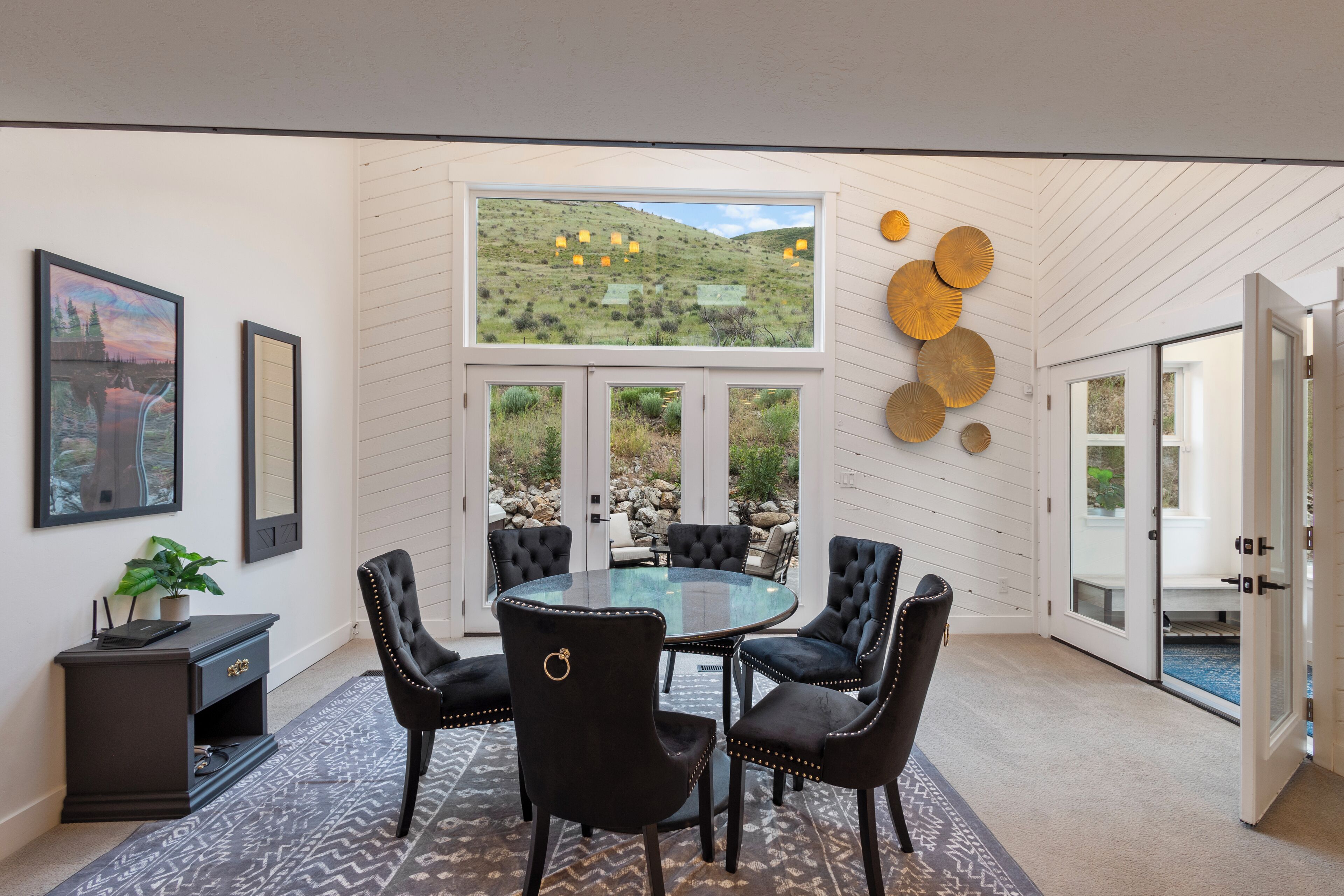 2nd dining room: bright, seats 6, scenic views, near loft stairs & side entance.