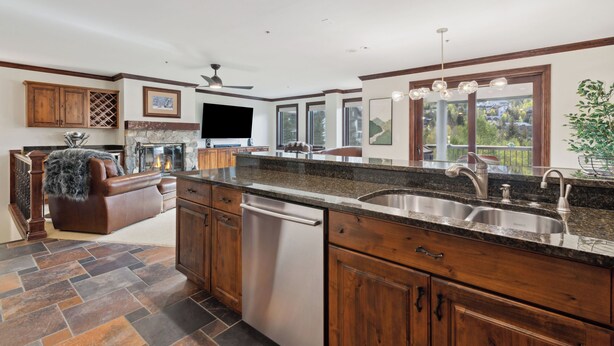A modern kitchen with granite countertops, stainless steel appliances, and wooden cabinetry. - Spacious 2BD + Den, Ski In Out
In the Heart of Beaver Creek Village
Pool jacuzzi (Beaver Creek)