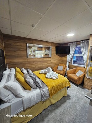 Coffres-forts dans les chambres, fer et planche à repasser