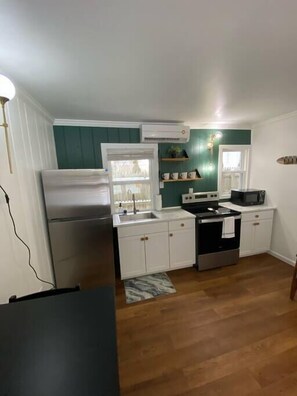 Fridge, microwave, oven, stovetop - Ludington Ave Suite 2- Blocks from downtown! (Ludington)