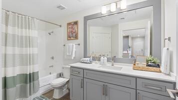 Hair dryer, towels, soap, shampoo