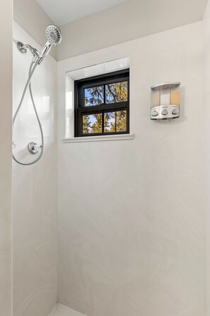 Shower, jetted tub, hair dryer, towels