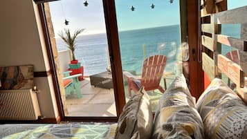 Habitación cuádruple Premier, 1 habitación, para no fumadores, vista al mar | Ropa de cama de alta calidad y edredón