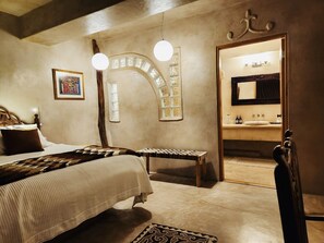 Superior Suite, 1 King Bed, Non Smoking, Partial Ocean View | Egyptian cotton sheets, premium bedding, down comforters, minibar - Alegria Suites Centro Historico (Todos Santos)