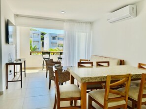 Design Apartment | Living area | 50-inch flat-screen TV with digital channels, Netflix - Almarena Apartments Coto Coral (Mazatlán)