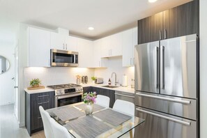 Fridge, microwave, oven, stovetop - 2BR 2BA Capitol Hill Cozy Haven- Rooftop (Seattle)