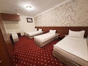 Basic Quadruple Room | Soundproofing, free WiFi - Kinan Al Azizia Makkah Hotel (Makkah)