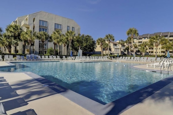 Immerse yourself in oceanfront relaxation with family-friendly amenities, including a zero-entry heated pool, kiddie pool, and spa available YEAR-AROUND!