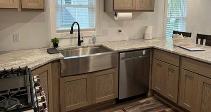 Remodeled home with pontoon rental 2 decks Private beach playground volleyball