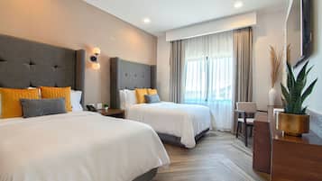 Ropa de cama de alta calidad, cubrecamas y artículos del minibar gratis