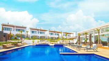 Outdoor pool, open 10:00 AM to 10:00 PM, pool umbrellas, sun loungers