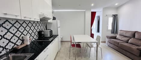 Fridge, microwave, coffee/tea maker, toaster