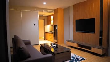 EXECUTIVE SUITE | Zona de estar | Smart TV de 50 pulgadas con canales digitales