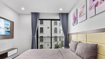 Apartemen Deluks, 1 kamar tidur, balkon | 1 kamar tidur dan Wi-Fi gratis