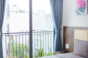 Deluxe Apartment, 1 Bedroom, Balcony | 1 bedroom, free WiFi - M.IA BEACH HOTEL & APARTMENT DA NANG (Da Nang)