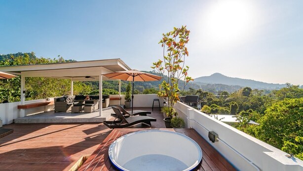 A rooftop terrace with a pool, outdoor seating, and a view of the surrounding landscape. - The Scoop Sea view Kamala 10km to Patong (Kamala)