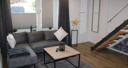 Ferienwohnung "Design Immo Rhein Main Rodgau" mit Gemeinschaftsgarten und WLAN