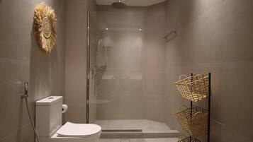 Bidet, towels, soap, shampoo