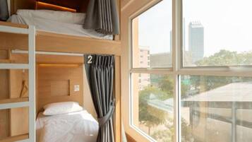 Desk, laptop workspace, free WiFi, bed sheets