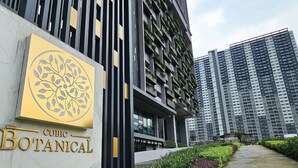 A modern building with a sign reading "CUBIC BOTANICAL". - Cubic Botanical Premium Suites atBangsar (Kuala Lumpur)
