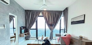 Suite exclusiva | Zona de estar | Una televisión de pantalla plana