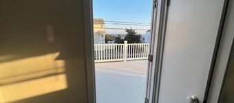 5 Bedrooms that Sleeps 14! Home has Ocean Views! 50 Feet from Beach Ramp!!!!