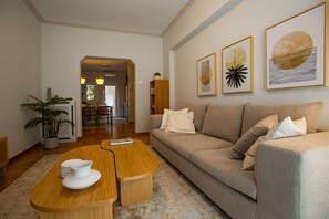 Design Apartment | Living area | 49-inch Smart TV with cable channels