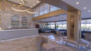A spacious lobby with a marble floor, seating area, and a reception desk. - Belenli Resort Hotel  (Serik)